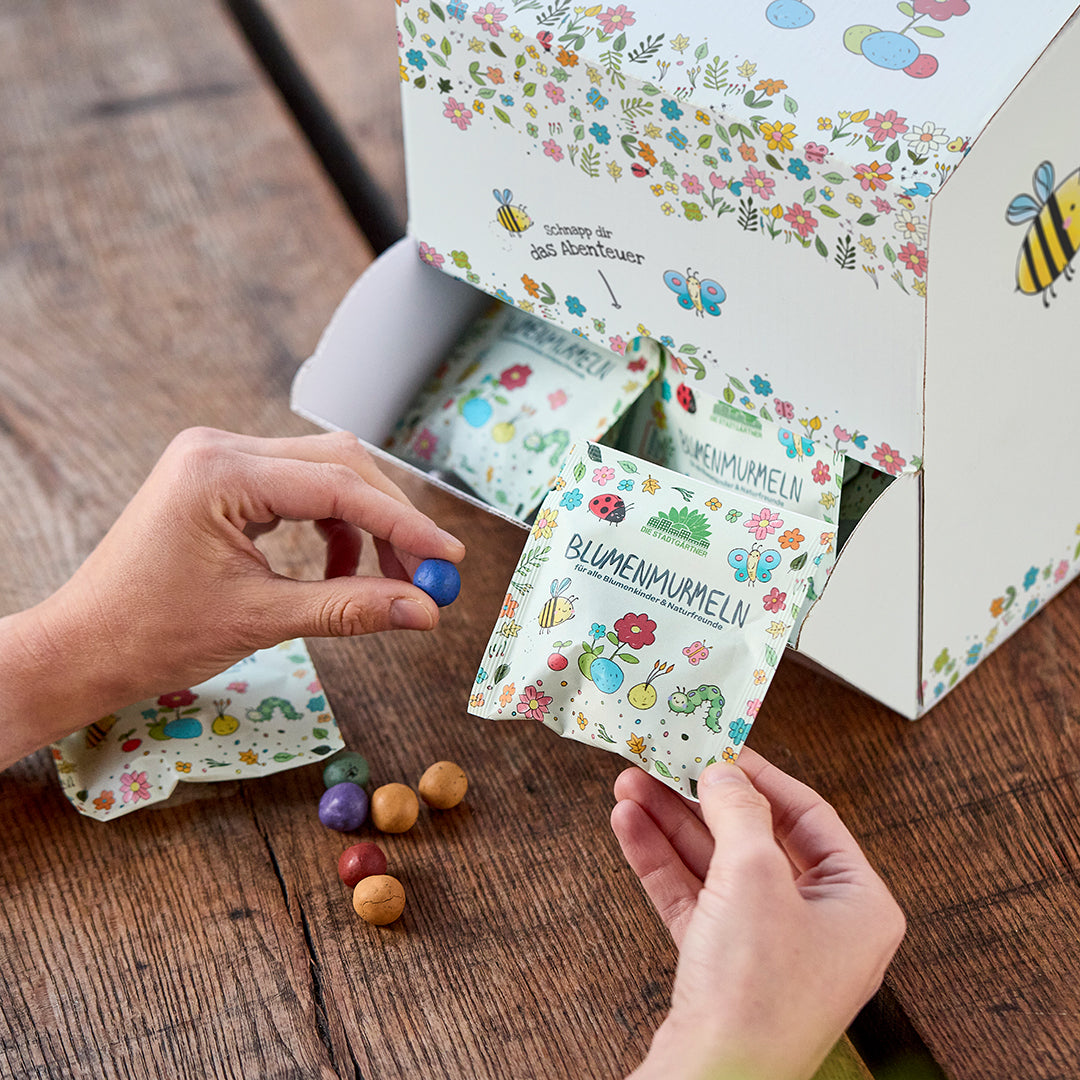 Dispenser - bloemknikkers in een zakje